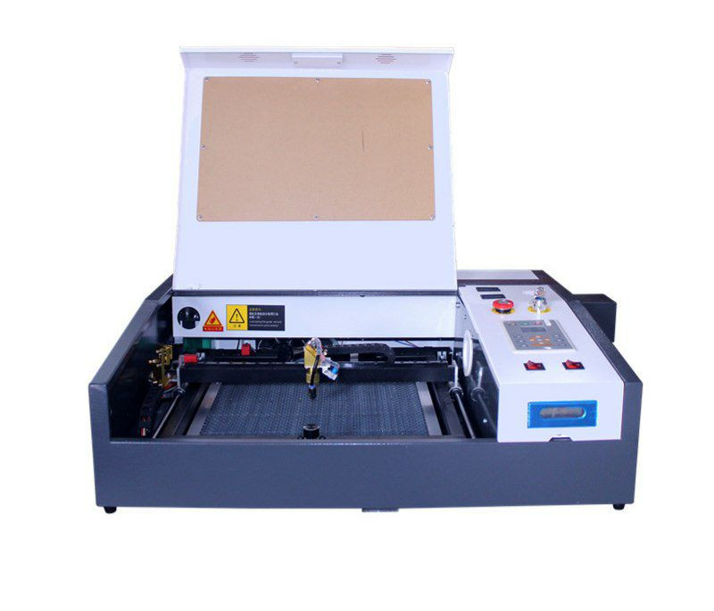 Machine de gravure laser K4040 et de découpe artisanat Bamboo glisse de peigne.